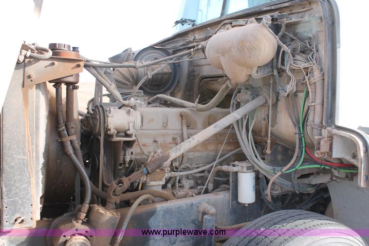 image for item O9361 1990 Volvo White GMC WG42T semi truck