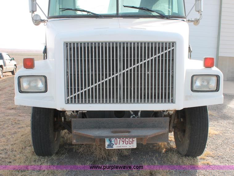 image for item O9361 1990 Volvo White GMC WG42T semi truck