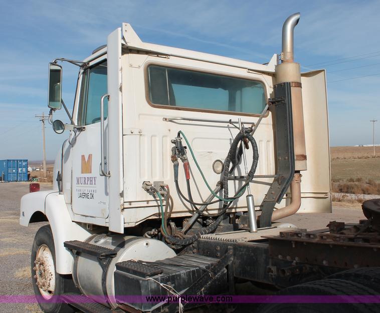 image for item O9361 1990 Volvo White GMC WG42T semi truck