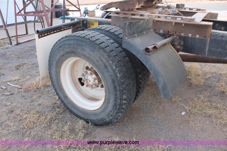 image for item O9361 1990 Volvo White GMC WG42T semi truck