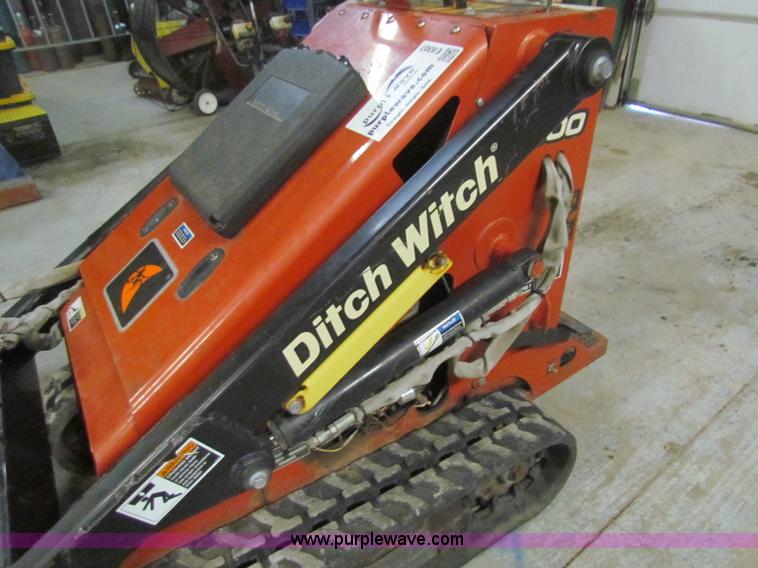 image for item E8307 Ditch Witch SK300 walk behind track loader