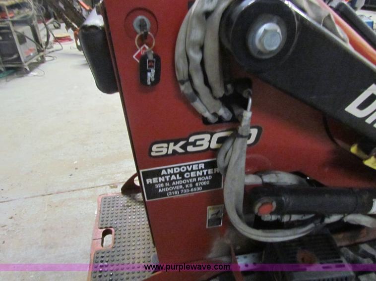 image for item E8307 Ditch Witch SK300 walk behind track loader