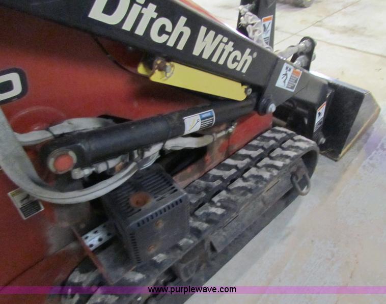 image for item E8307 Ditch Witch SK300 walk behind track loader