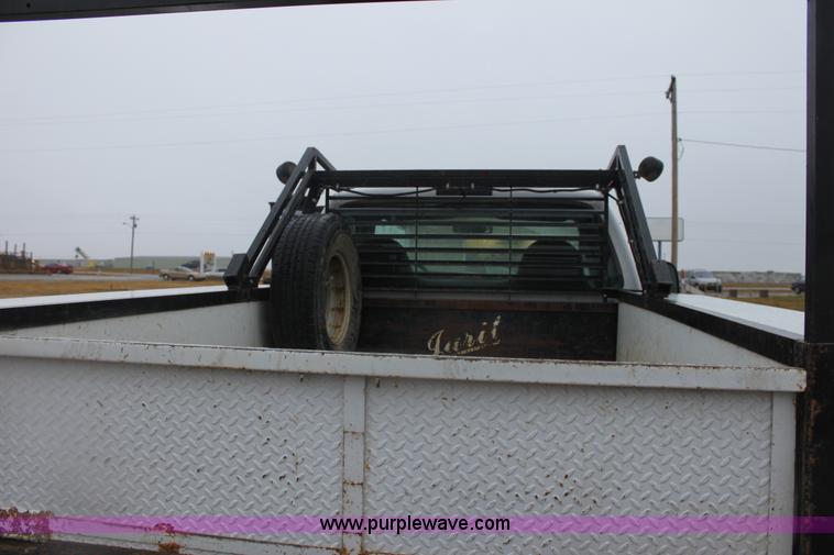 image for item E8348 2001 Ford F350 XL Super Duty flatbed pickup truck