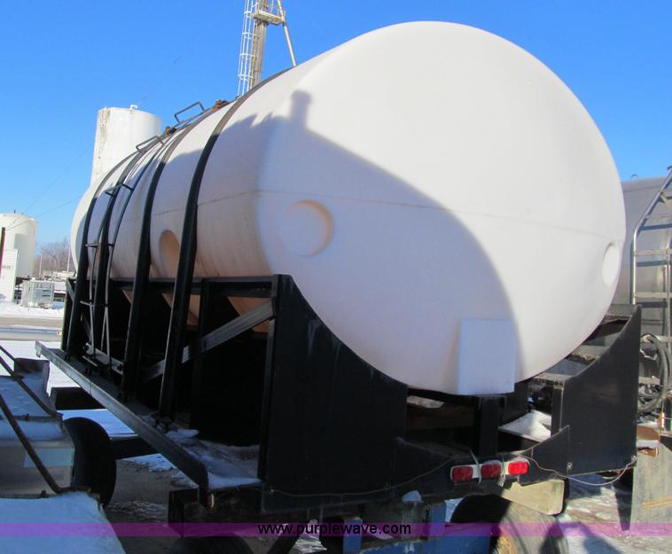 image for item D7049 Approximately 3,000 gallon poly fluid tank