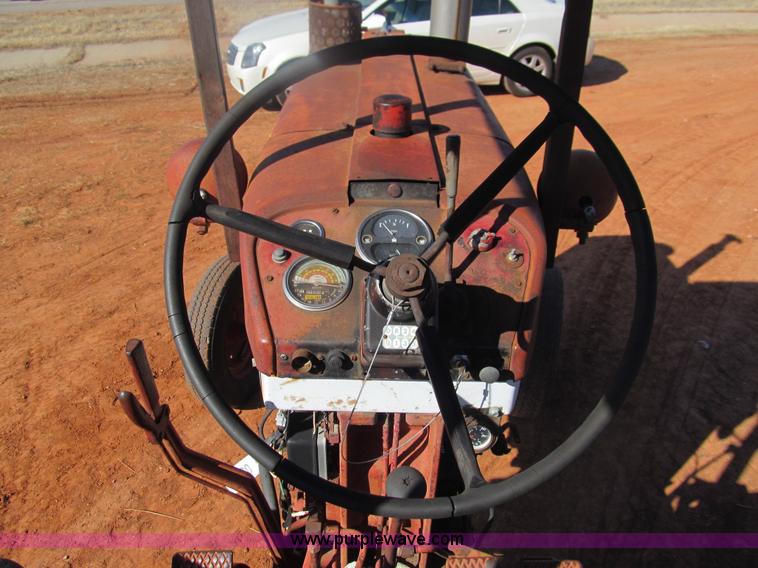 image for item E7530 1963 International Farmall 504 row crop tractor