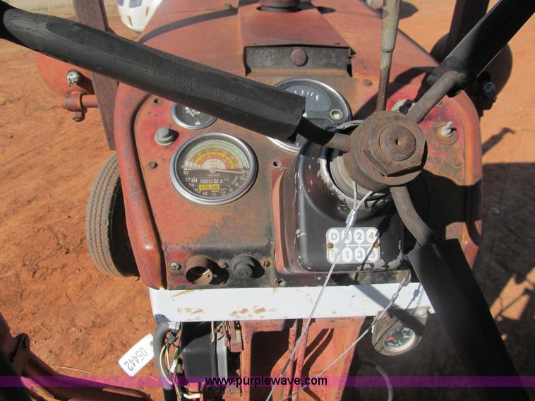 image for item E7530 1963 International Farmall 504 row crop tractor