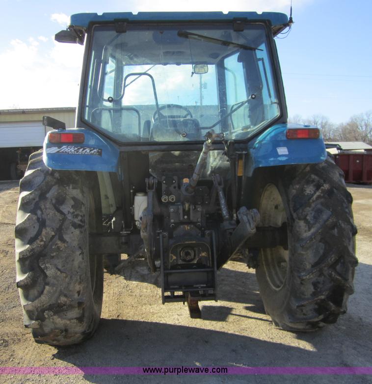 image for item F6569 1999 New Holland TL90 MFWD tractor