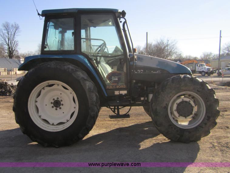 image for item F6569 1999 New Holland TL90 MFWD tractor