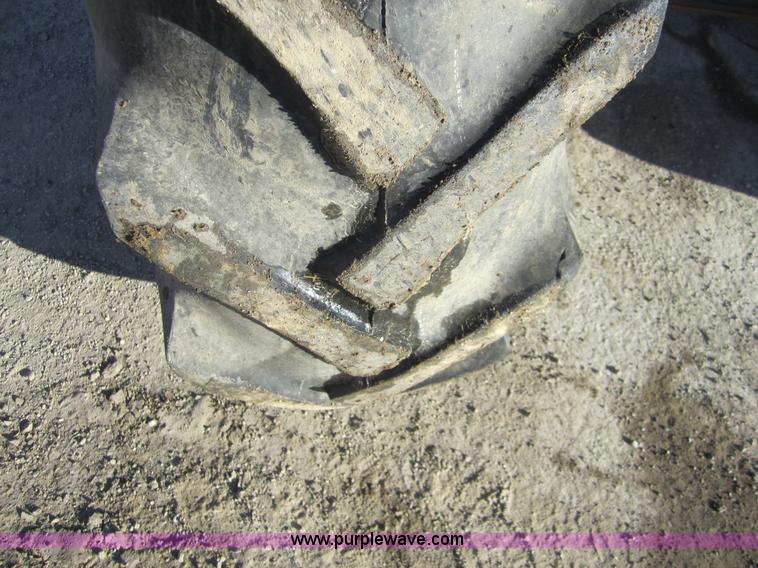 image for item F6569 1999 New Holland TL90 MFWD tractor