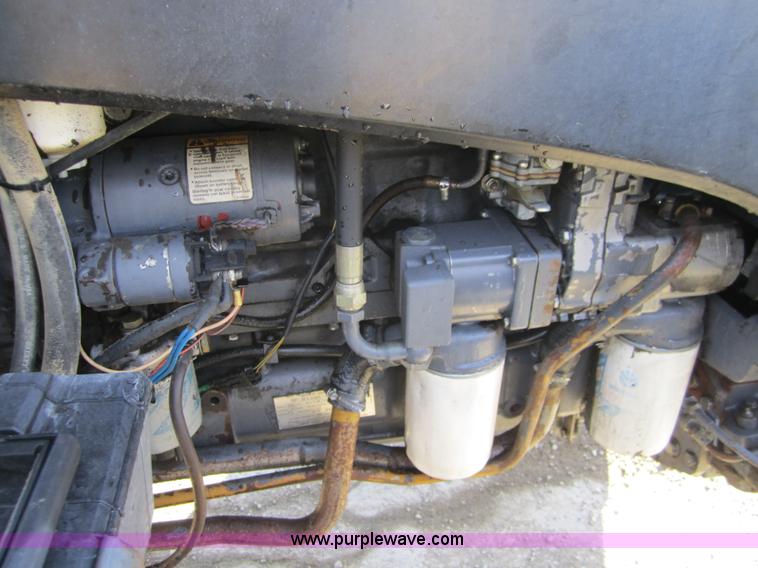 image for item F6569 1999 New Holland TL90 MFWD tractor