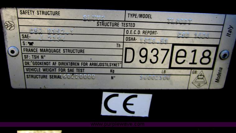 image for item F6569 1999 New Holland TL90 MFWD tractor