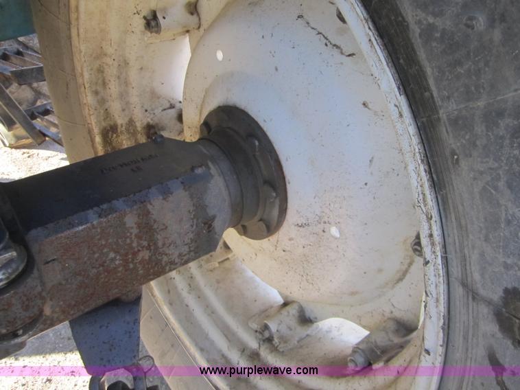 image for item F6569 1999 New Holland TL90 MFWD tractor