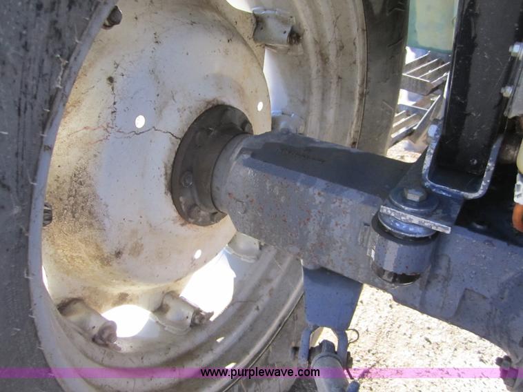 image for item F6569 1999 New Holland TL90 MFWD tractor