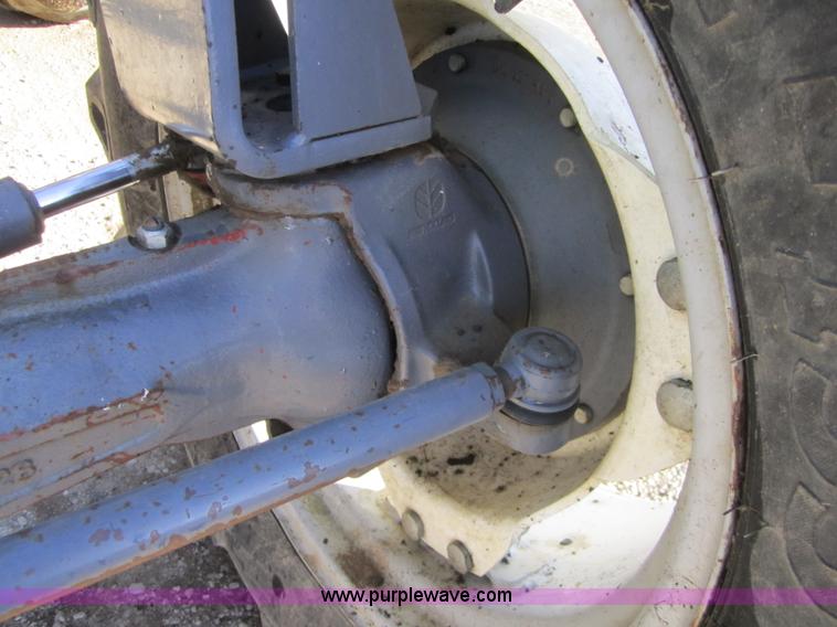 image for item F6569 1999 New Holland TL90 MFWD tractor