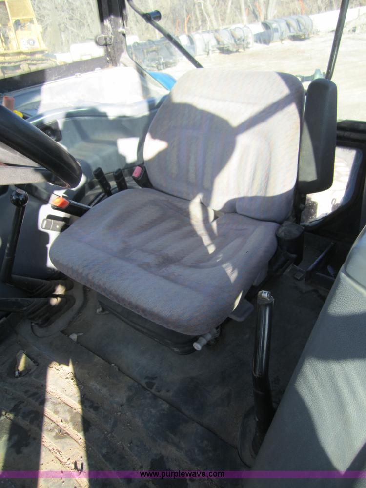 image for item F6569 1999 New Holland TL90 MFWD tractor