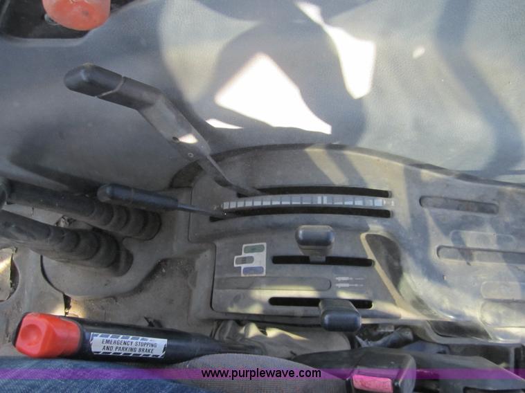 image for item F6569 1999 New Holland TL90 MFWD tractor