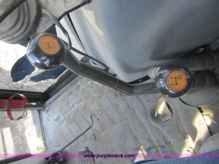 image for item F6569 1999 New Holland TL90 MFWD tractor