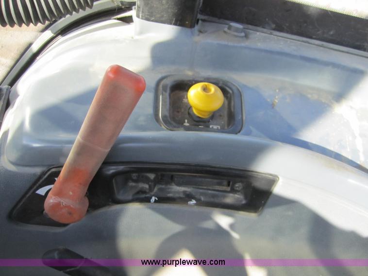 image for item F6569 1999 New Holland TL90 MFWD tractor