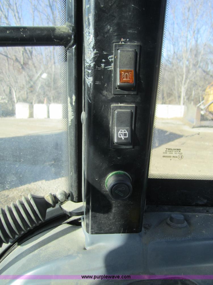 image for item F6569 1999 New Holland TL90 MFWD tractor