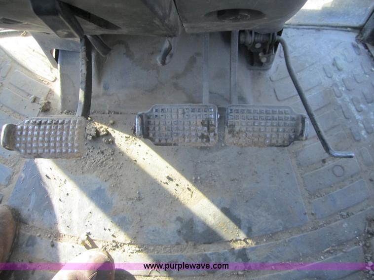 image for item F6569 1999 New Holland TL90 MFWD tractor