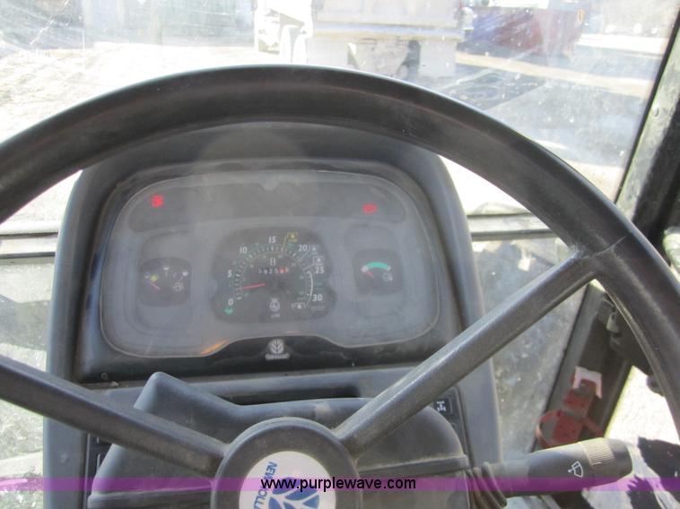 image for item F6569 1999 New Holland TL90 MFWD tractor