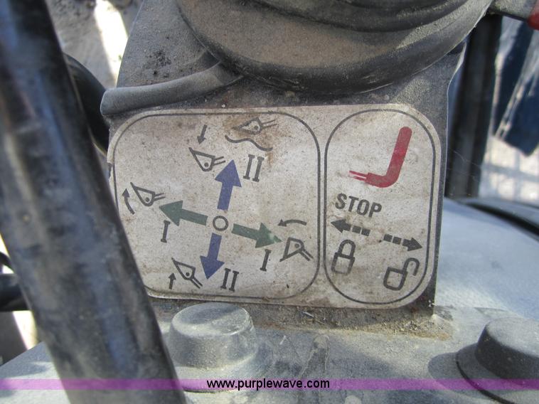 image for item F6569 1999 New Holland TL90 MFWD tractor