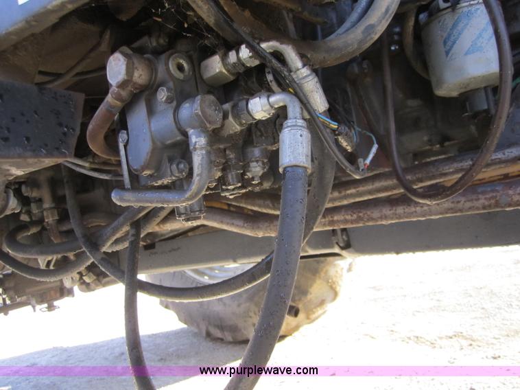 image for item F6569 1999 New Holland TL90 MFWD tractor