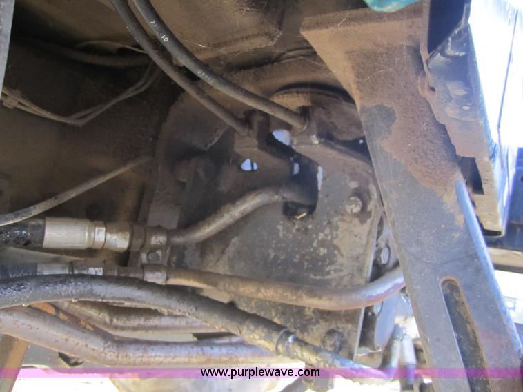 image for item F6569 1999 New Holland TL90 MFWD tractor