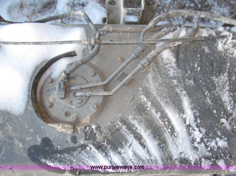 image for item K9637 65 gallon fuel tank removed from GMC Thomas school bus