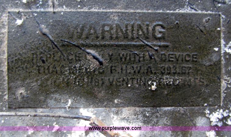 image for item K9637 65 gallon fuel tank removed from GMC Thomas school bus