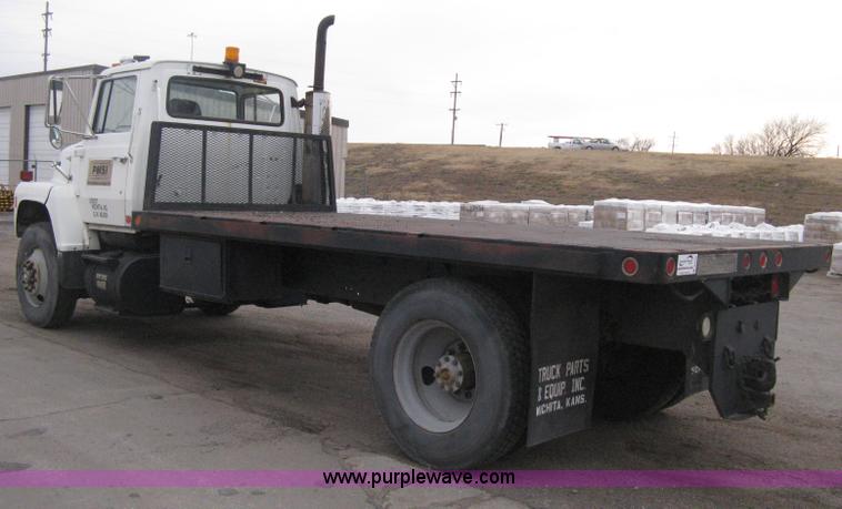 image for item B8449 1988 Ford L8000 flatbed truck