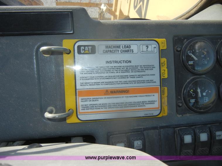 image for item D4583 1998 Caterpillar TH103 telehandler