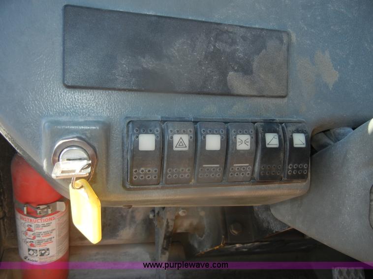 image for item D4583 1998 Caterpillar TH103 telehandler