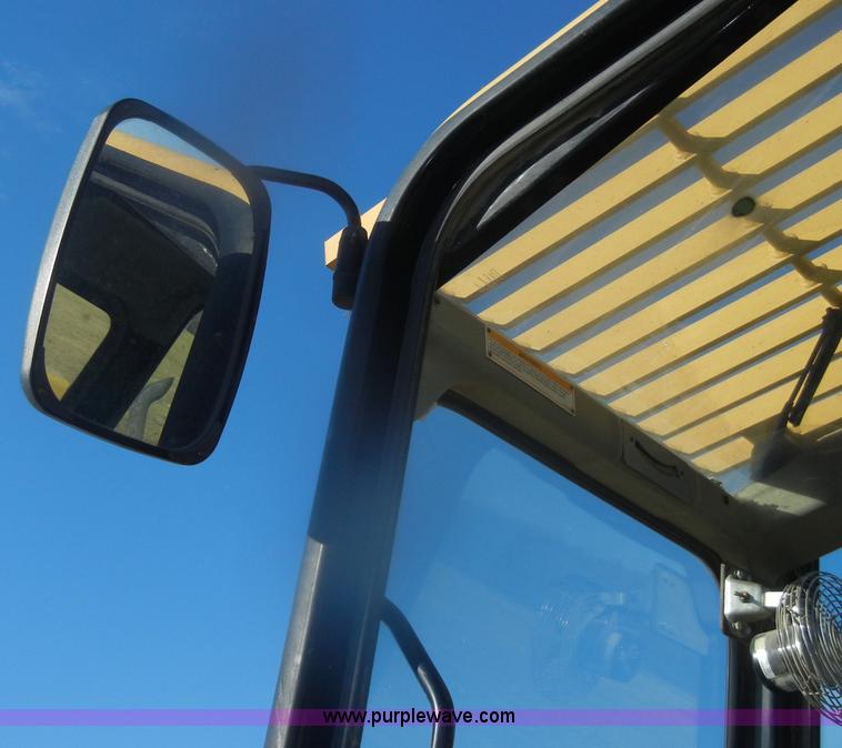 image for item D4583 1998 Caterpillar TH103 telehandler