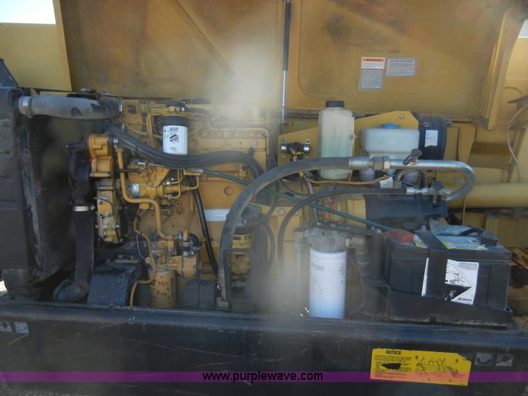 image for item D4583 1998 Caterpillar TH103 telehandler