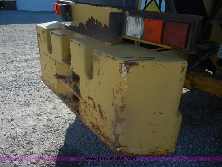 image for item D4583 1998 Caterpillar TH103 telehandler