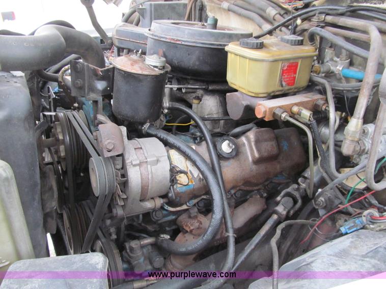 image for item D7064 1984 Ford boom truck