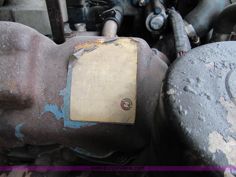 image for item D7064 1984 Ford boom truck