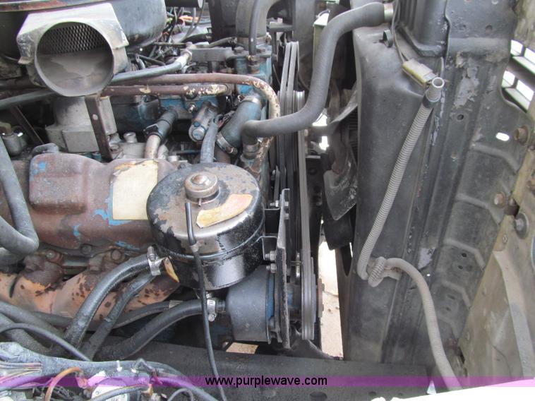 image for item D7064 1984 Ford boom truck