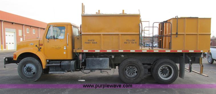 image for item F4170 1998 International 4900 flatbed/paint nurse truck