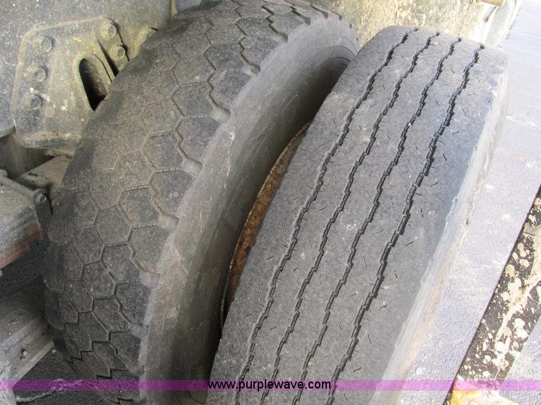 image for item F4170 1998 International 4900 flatbed/paint nurse truck