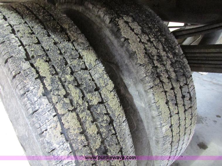 image for item F4179 2004 Chevrolet Silverado 3500 Crew Cab flatbed pickup truck