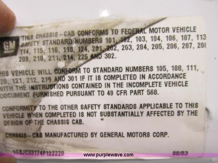 image for item F4179 2004 Chevrolet Silverado 3500 Crew Cab flatbed pickup truck