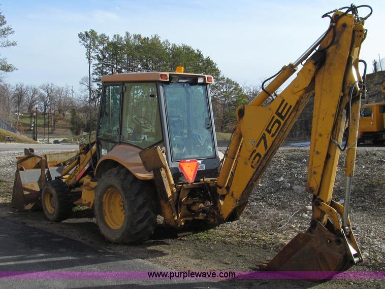 image for item E3641 1999 New Holland 675E backhoe