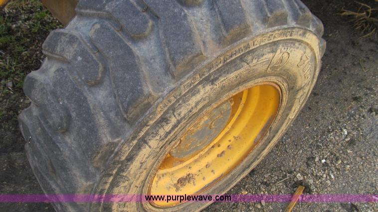 image for item E3641 1999 New Holland 675E backhoe