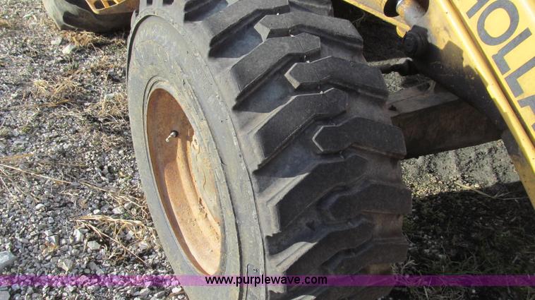 image for item E3641 1999 New Holland 675E backhoe