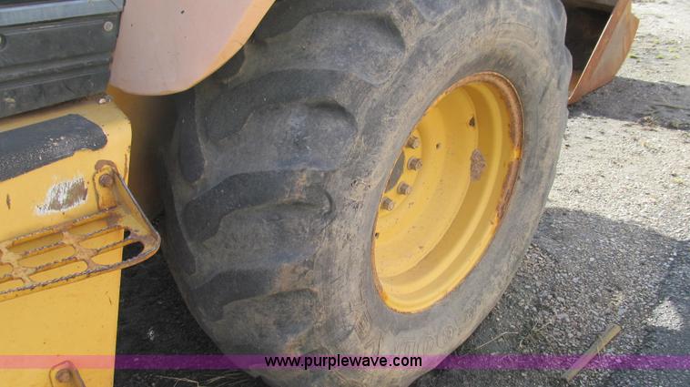 image for item E3641 1999 New Holland 675E backhoe