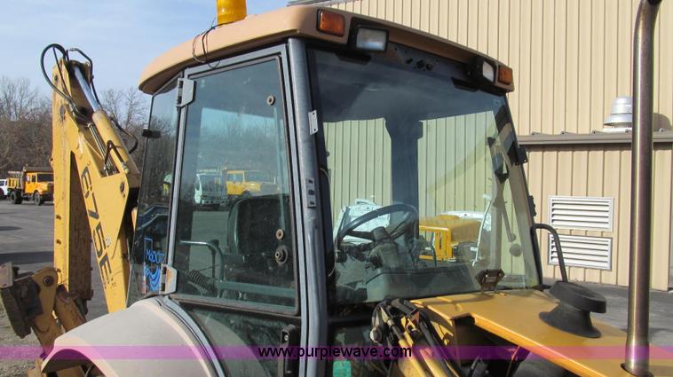 image for item E3641 1999 New Holland 675E backhoe