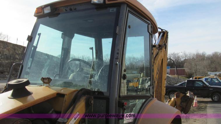 image for item E3641 1999 New Holland 675E backhoe